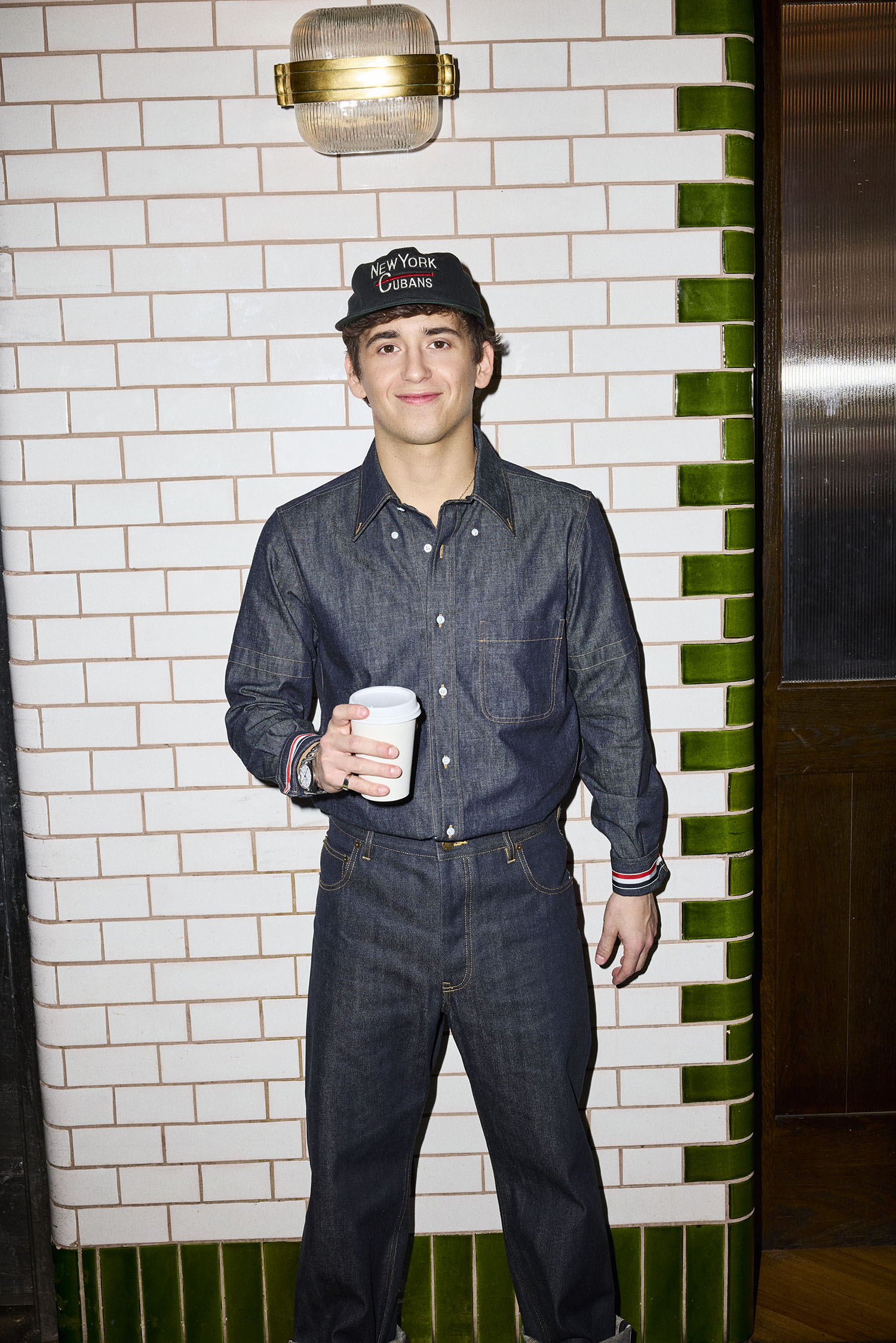 Marcello Hernandez wears a full look by Thom Browne.