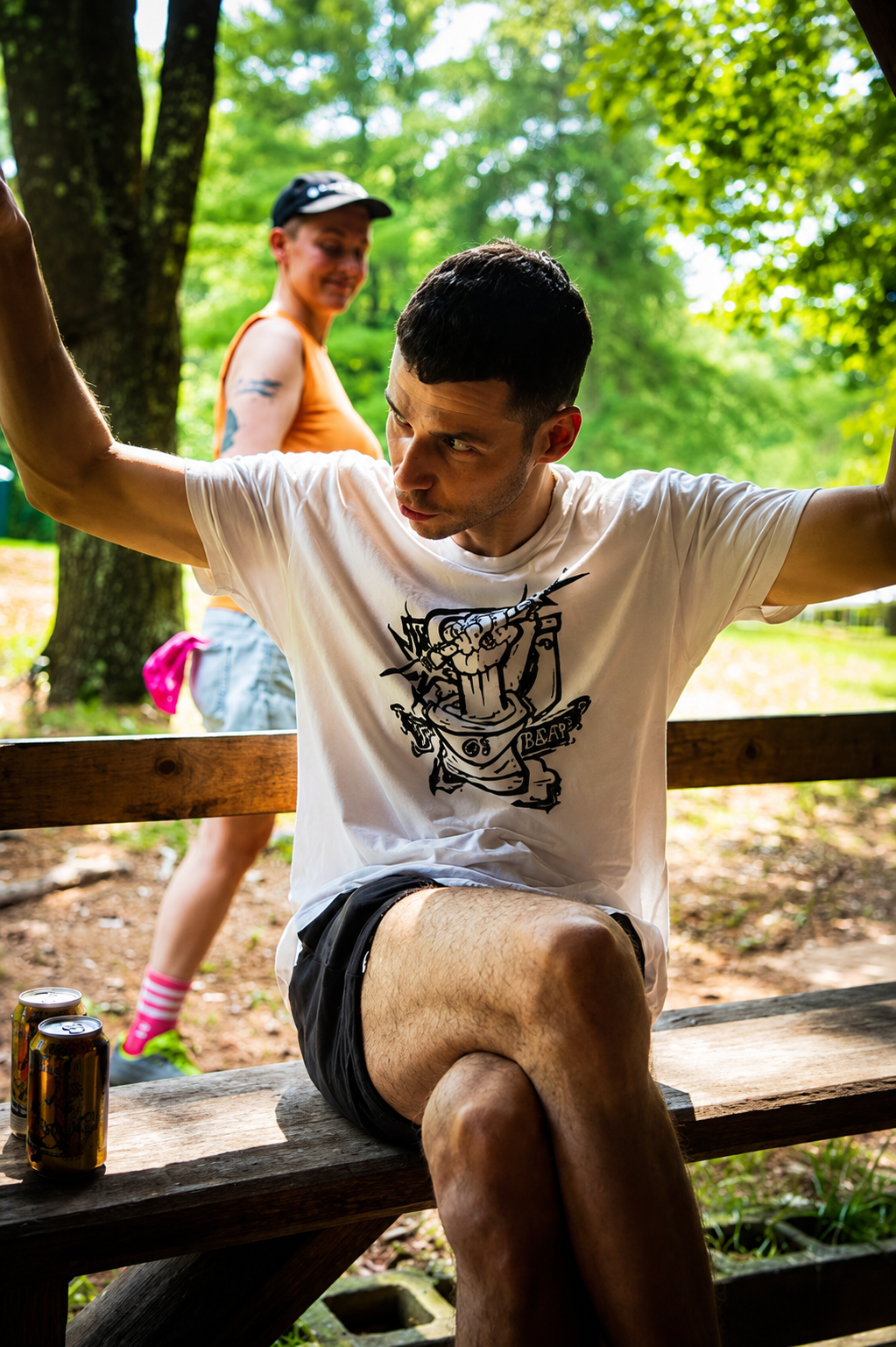 Seva Granik gesticulates on a bench at queer dance festival Honcho