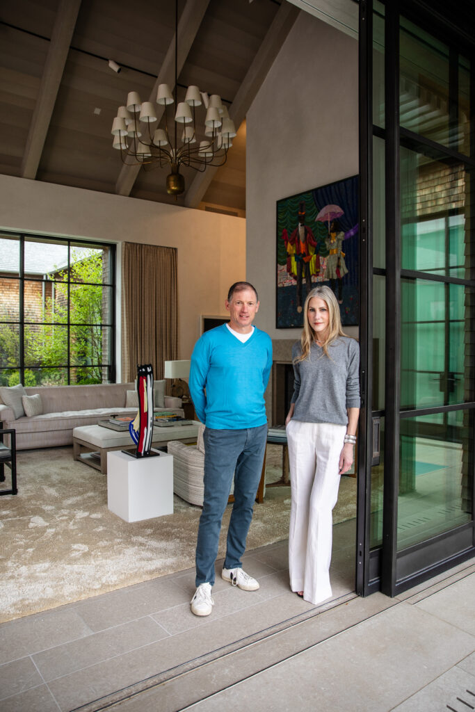 Glenn and Amanda Fuhrman at home with their art collection