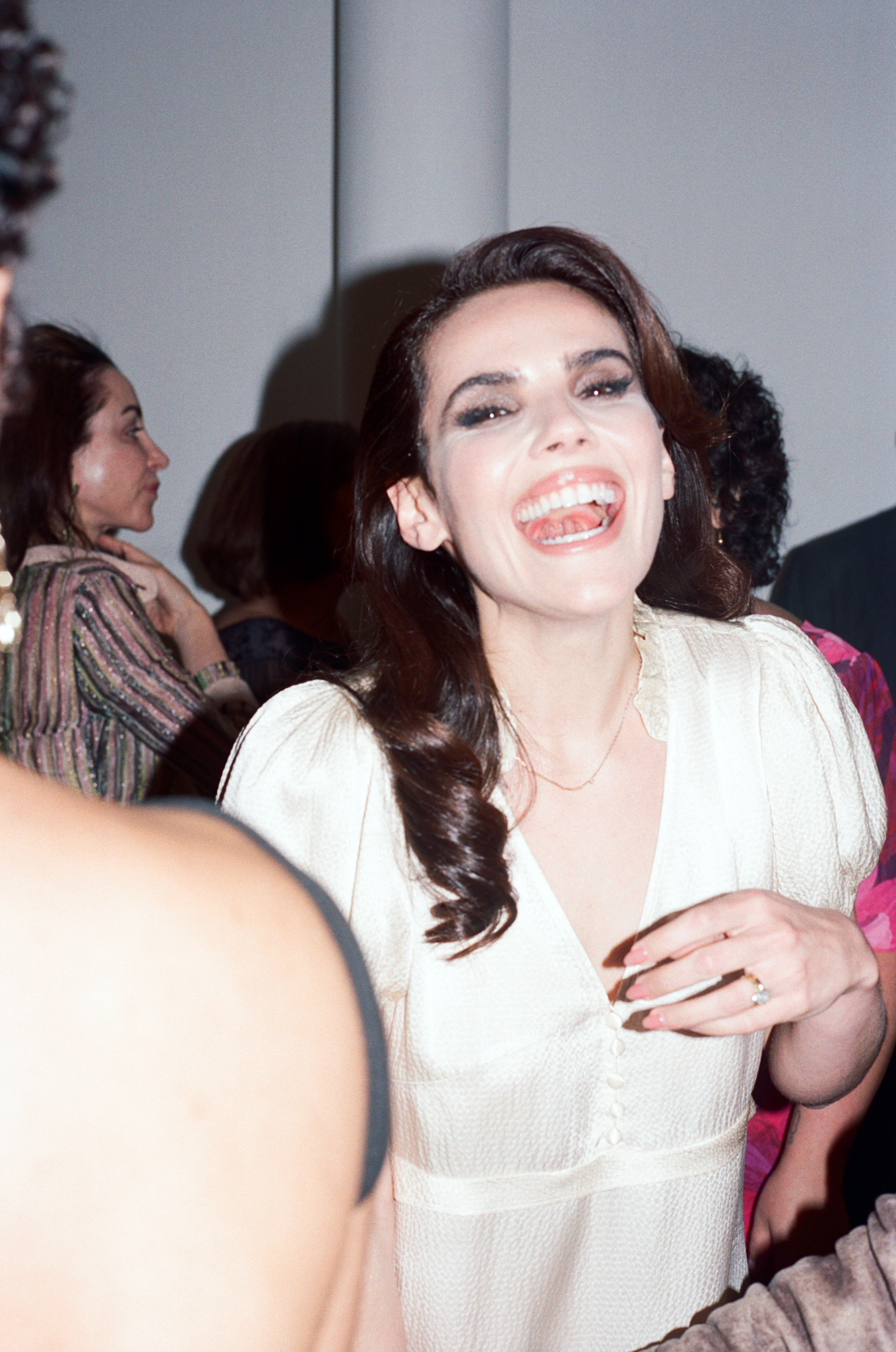Sara Apple Maliki smiles at her wedding party