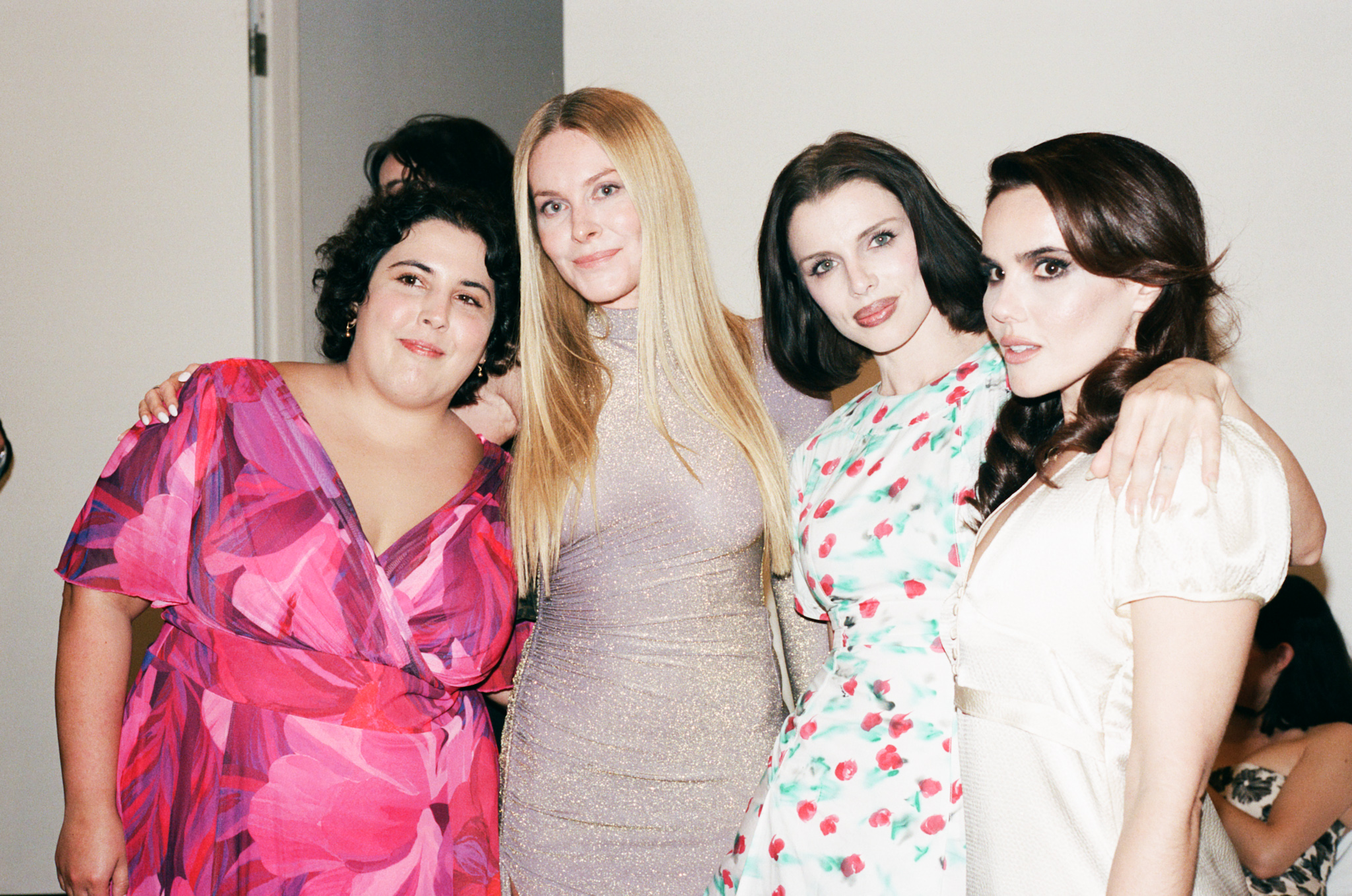 Actress and writer Julia Fox (center right) with filmmaker Sara Apple Maliki (far right) on her wedding night to artist Pietro Alexander in New York.