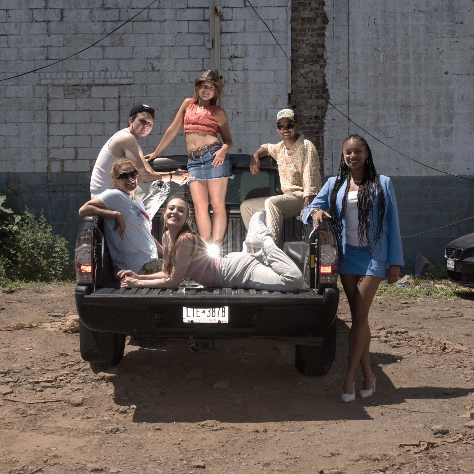 The cast of Truck pose for a portrait