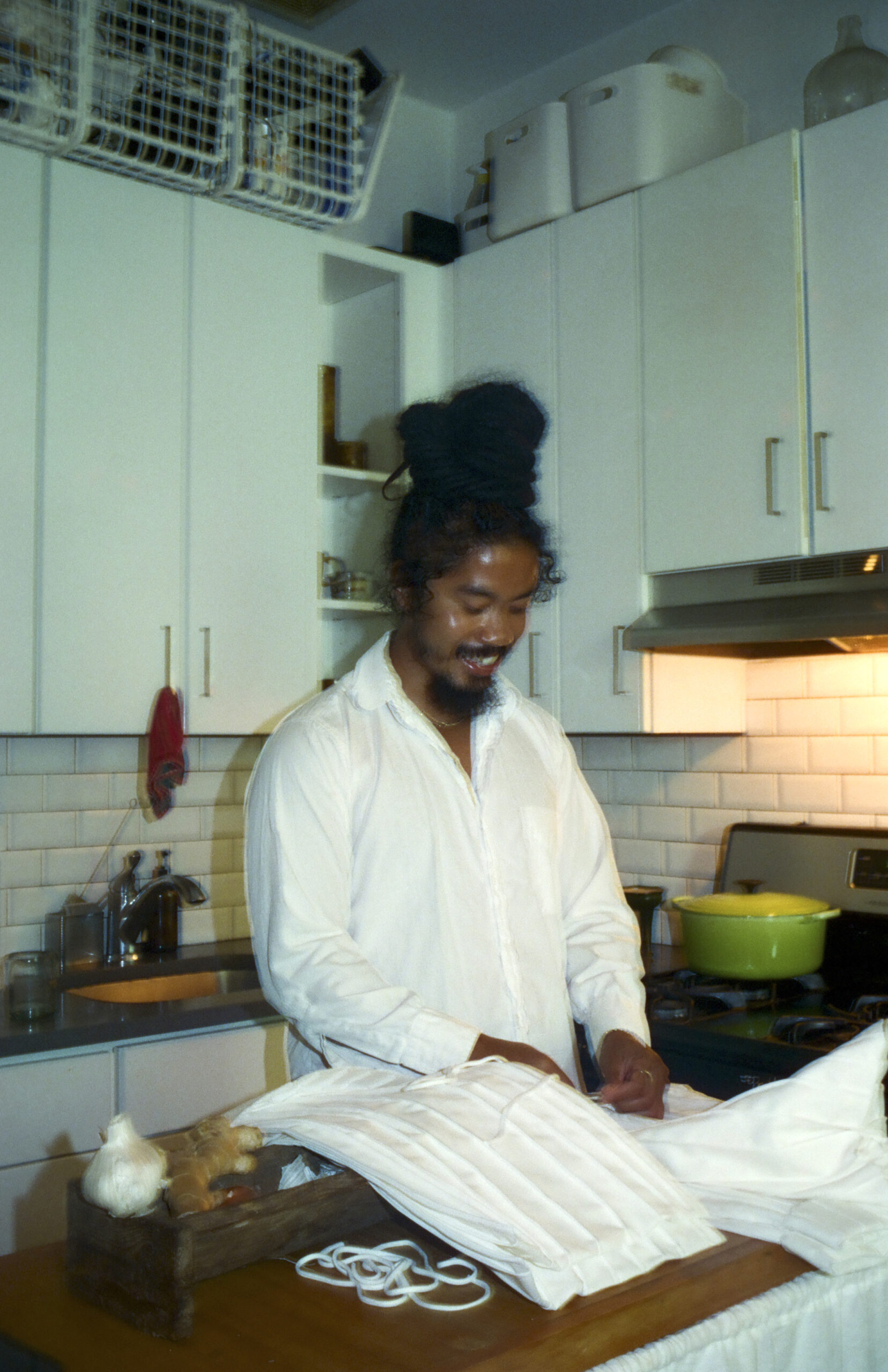 Fashion designer Connor McKnight in their studio and apartment