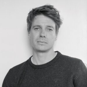 Ben Eastham poses for a black-and-white portrait.