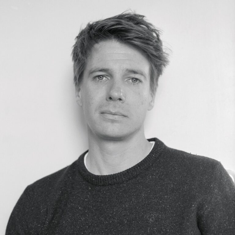 Ben Eastham poses for a black-and-white portrait.