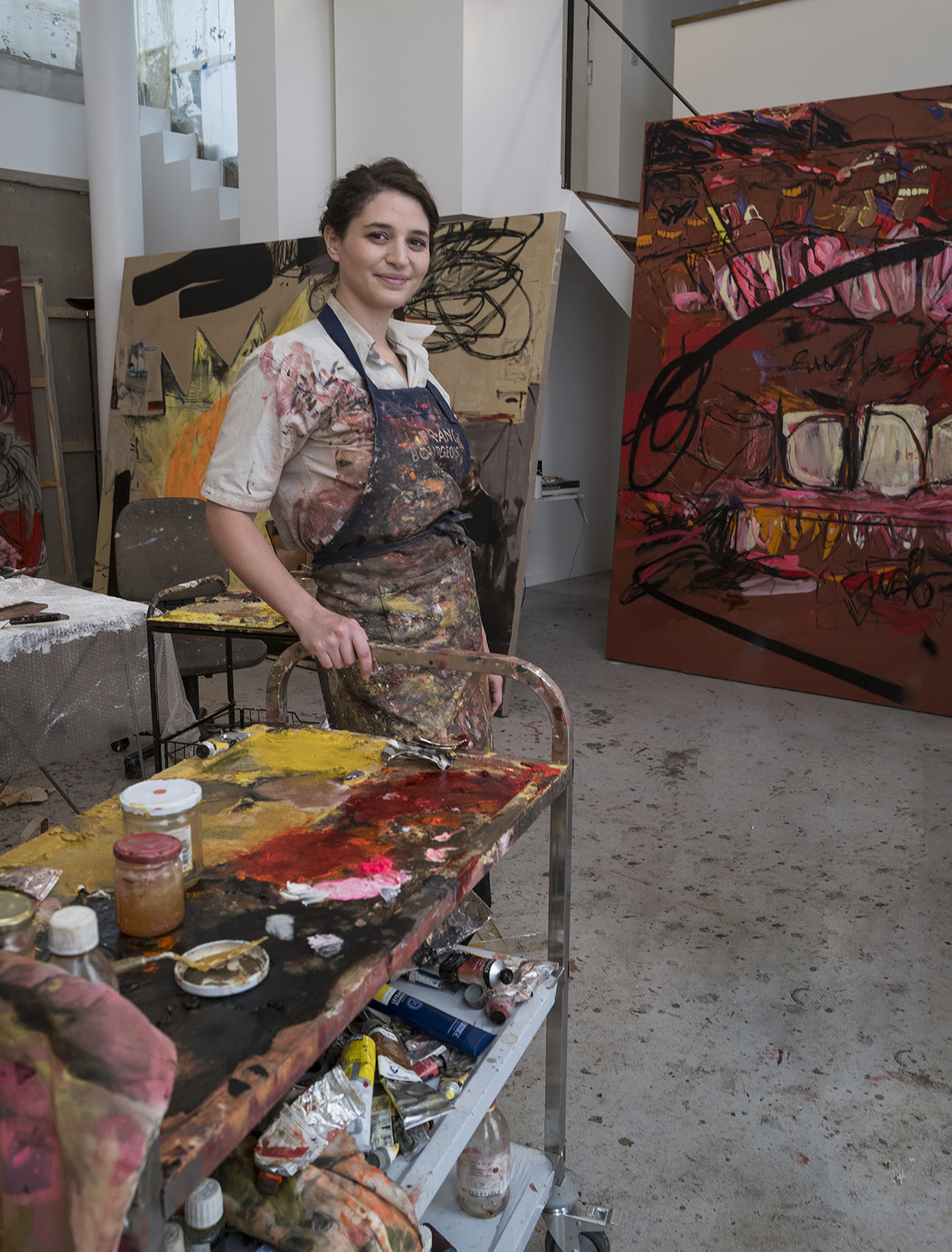 Painter and artist Dora Jeridi in her studio. ©Antoine Schneck.