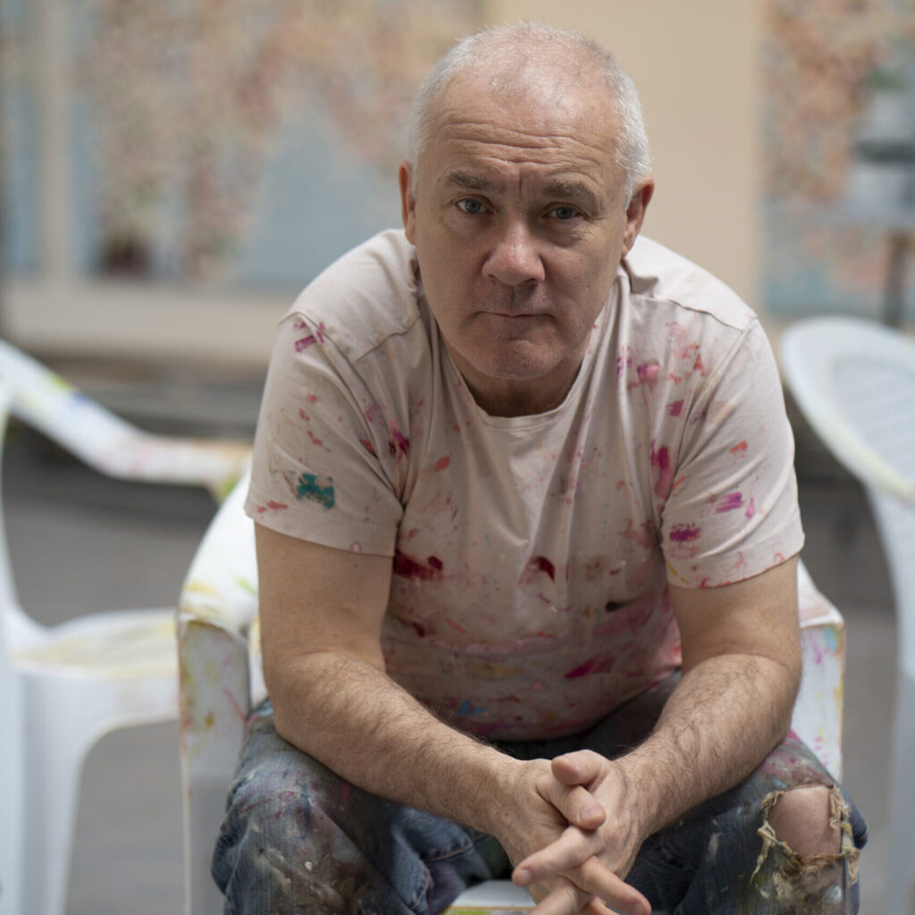 Artist Damien Hirst at Thames Wharf Studio for his collaboration with vintage champagne house Dom Pérignon for their 2026 limited edition series. Image courtesy of Dom Pérignon.